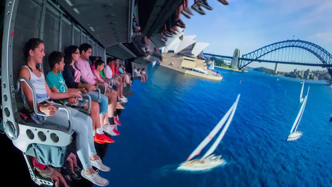 <p>Soarin’ Around the World lets visitors explore the world without leaving Florida. Unlike other simulator-type rides that tend to nauseate or induce vertigo, Soarin’ feels calm, an easygoing attraction that sees tourists soar across the world onboard a hang-glider.</p><p>The ride utilizes its signature “smellitizer” to pump in various natural scents (salty but pleasant Caribbean air, African dirt, etc.) and a mechanical lift system, suspending travelers in front of a massive IMAX screen displaying various well-known locations across the globe, such as the Eiffel Tower and the Great Wall of China.</p><p>For younger guests or those who tend to veer away from intense thrill rides, Soarin’ makes a welcome change of pace, allowing them to enjoy a calming flight, atmospheric scents, and an awe-inspiring soundtrack perfect for everyone.</p>