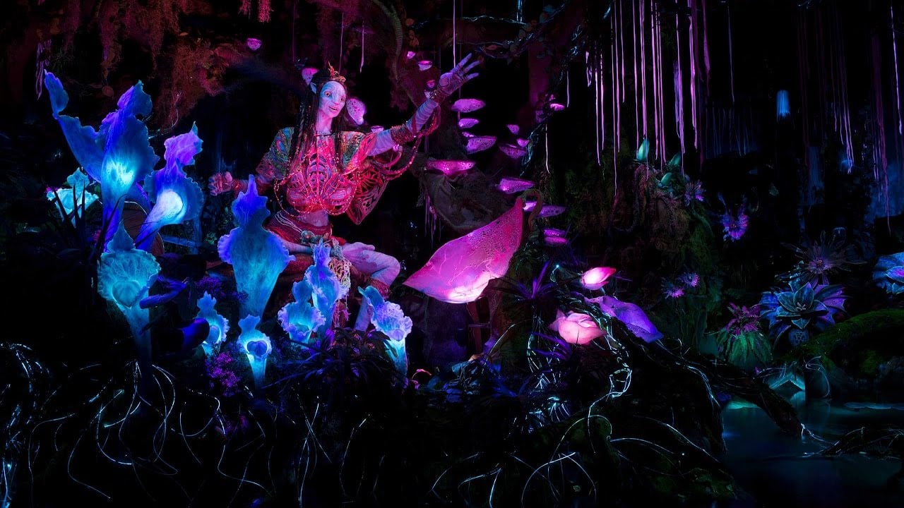 <p><span>Since Pandora – The World of </span><em><span>Avatar</span></em><span> opened in 2017, Disney’s Animal Kingdom went from being one of the more mediocre parks in Walt Disney World to one of the best.</span></p><p><span>Pandora takes visitors into the fictional setting of </span><a class="editor-rtfLink" href="https://wealthofgeeks.com/avatar-video-game-footage-revealed-at-ubisoft-forward/"><span>the award-winning science fiction film, </span><em><span>Avatar</span></em></a><span>, a bioluminescent world full of various alien flora and floating rock formations that will take your breath away. It’s an even better experience at night. </span></p><p><span>Flight of Passage features guests climbing on the back of a bicycle-type seat, simulating a ride atop a banshee (one of the movie’s pterodactyl-like aliens the Na’vi use for travel) through the vivid 3D world of Pandora. </span><span>No singular expression summarizes Flight of Passage; it’s just too beautiful for words.</span></p><p><span>Like most Disney rides, it features a queue that takes visitors through the exterior mountains of Pandora to detailed indoor labs, including seeing a full-sized Na’vi in person.</span></p>