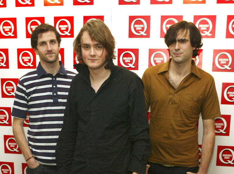Tom Chaplin, centre, Tim Rice-Oxley, right, and Richard Hughes at the Q Awards 2004 (Photo: Dave Hogan/Getty Images)