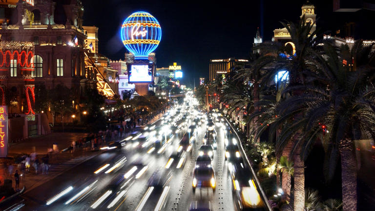 Cars at night on the Las Vegas Strip. Las Vegas Strip Lead