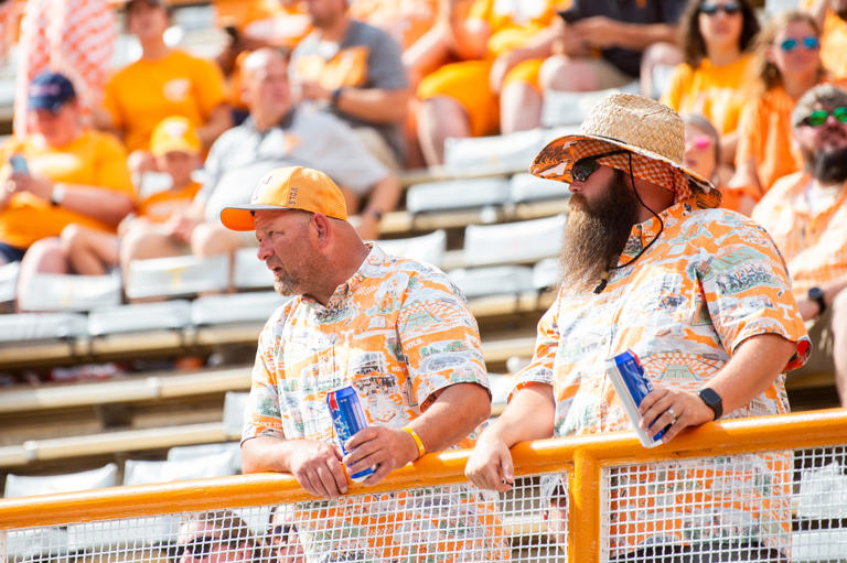 During Tennessee football's home opener against Austin Peay, two Vols fans each enjoy a beer purchase inside Neyland Stadium, one year after three underage sales nearly caused alcohol to be removed from concession stands. As part of an agreement between the city of Knoxville and the beer vendor, Aramark, all IDs must be checked by an employee and scanned.