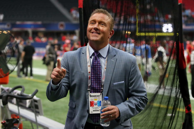 ATLANTA, GA - SEPTEMBER 06: Kirk Herbstreit points to the crowd before the Chick-fil-A Kickoff Game between the Louisville Cardinals and the Ole Miss Rebels on September 6, 2021 at Mercedes Benz Stadium in Atlanta, Georgia. (Photo by Michael Wade/Icon Sportswire via Getty Images) Photo by Michael Wade/Icon Sportswire via Getty Images
