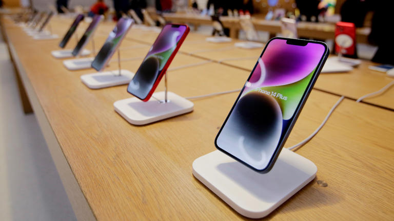 Several iPhones are displayed in the Apple Store on Feb. 3, 2023, in New York City. Leonardo Munoz/VIEWpress via Getty Images