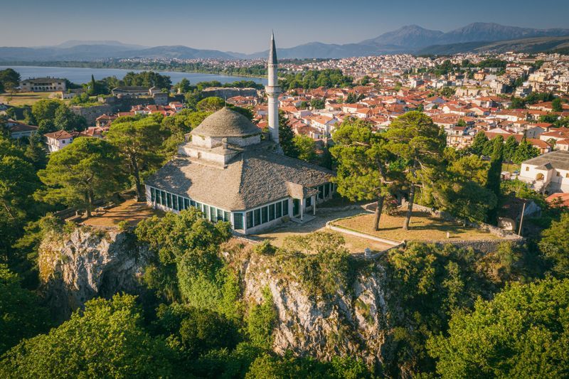 <p>Ioannina is the capital of Epirus, and it is surrounded by Lake Pamvotida, a beloved hallmark of the city. The city is home to charming cafe-lined streets, the famed Castle of Ioannina, and picturesque landscapes of the mountains surrounding the area.</p>