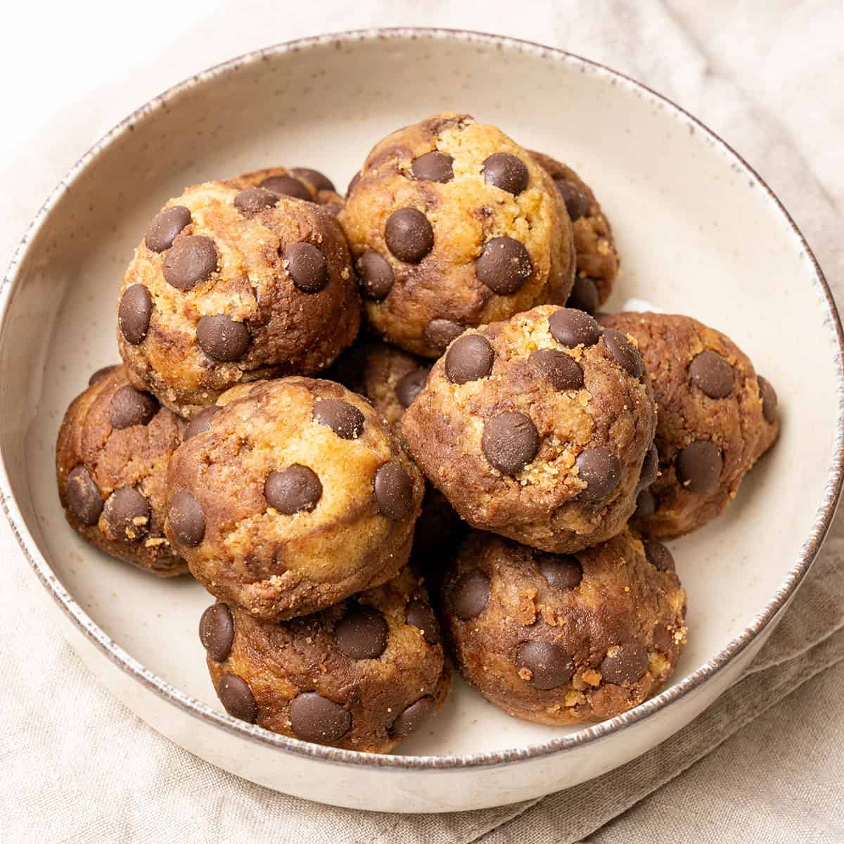 <p>Indulge in nostalgia with these <strong><a href="https://www.spatuladesserts.com/edible-cookie-dough-bites-no-bake/">edible cookie dough bites</a></strong> – the perfect no-bake, hassle-free treat to satisfy your sweet tooth! Crafted from just 7 simple ingredients, the dough is infused with aromatic vanilla and generously studded with mini chocolate chips, offering a delightful mix of buttery goodness and chocolatey crunch.</p><p><strong>Go to the recipe: <a href="https://www.spatuladesserts.com/edible-cookie-dough-bites-no-bake/">Edible Cookie Dough Bites</a></strong></p>