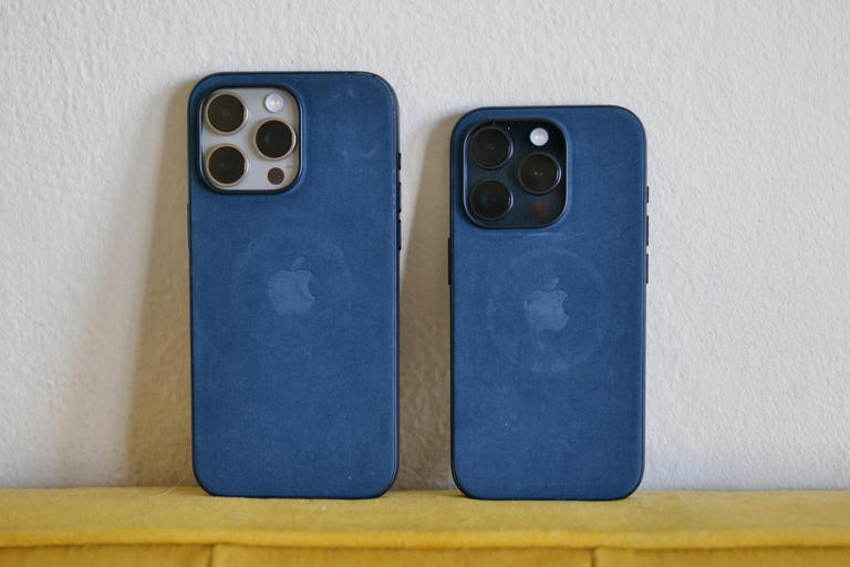 The iPhone 15 Pro Max (left) and 15 Pro with Apple's FineWoven cases. This photo was taken by CNET's Patrick Holland after a week of use.