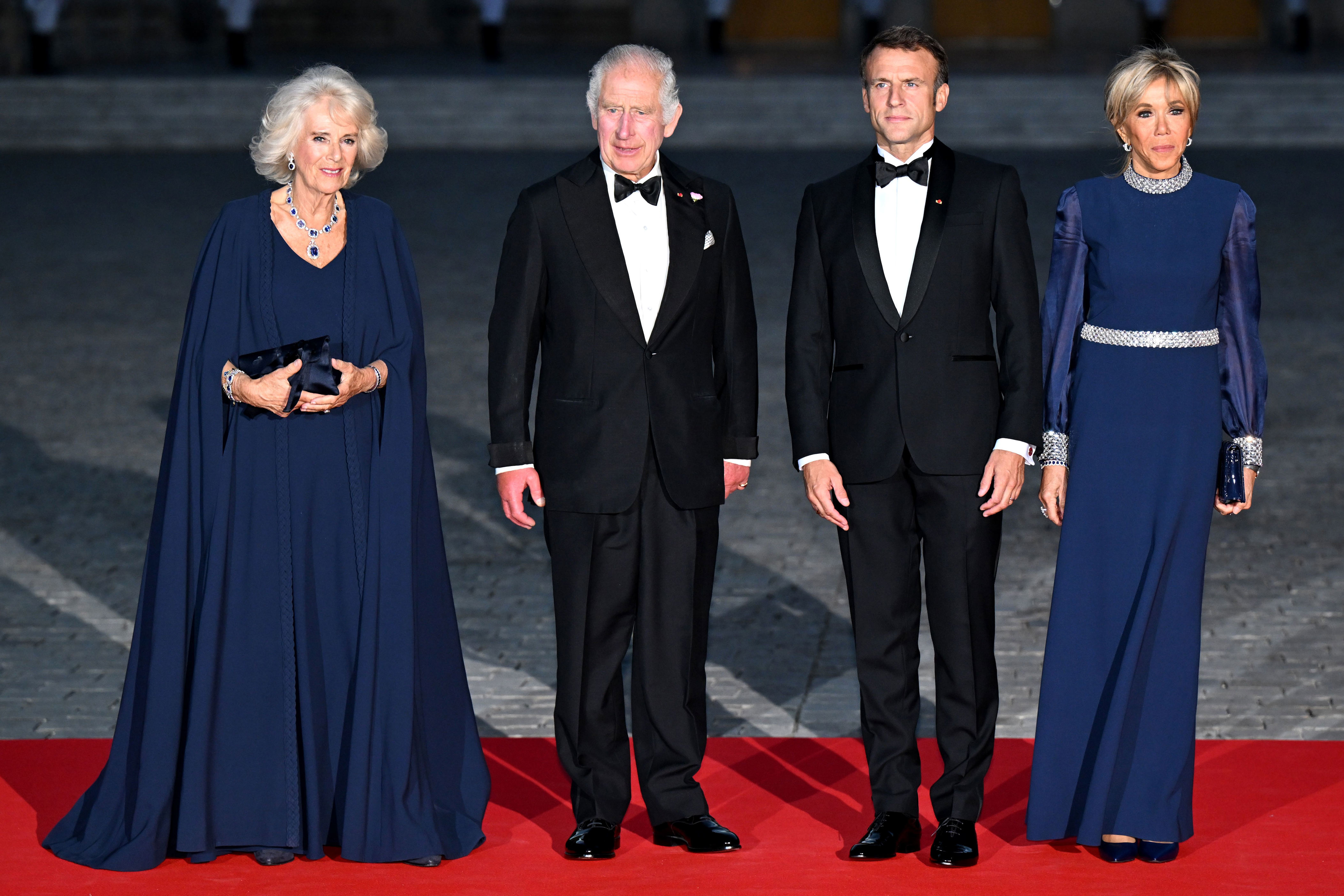 <p><span>Queen Camilla and King Charles III joined France's President Emmanuel Macron and first lady Brigitte Macron as they arrived at the Palace of Versailles outside Paris to celebrate the U.K.-France relationship at a state banquet on Sept. 20, 2023, the first night of </span><a href="https://www.wonderwall.com/entertainment/king-charles-iii-and-queen-camilla-in-france-see-the-best-photos-from-the-royals-official-state-visit-791038.gallery">the British royals' three-day visit</a><span>.</span></p><p>MORE: <a href="https://www.wonderwall.com/celebrity/royals-line-british-throne-order-succession-3012158.gallery?photoId=648489">The first 29 British royals in the line of succession behind King Charles III</a></p>