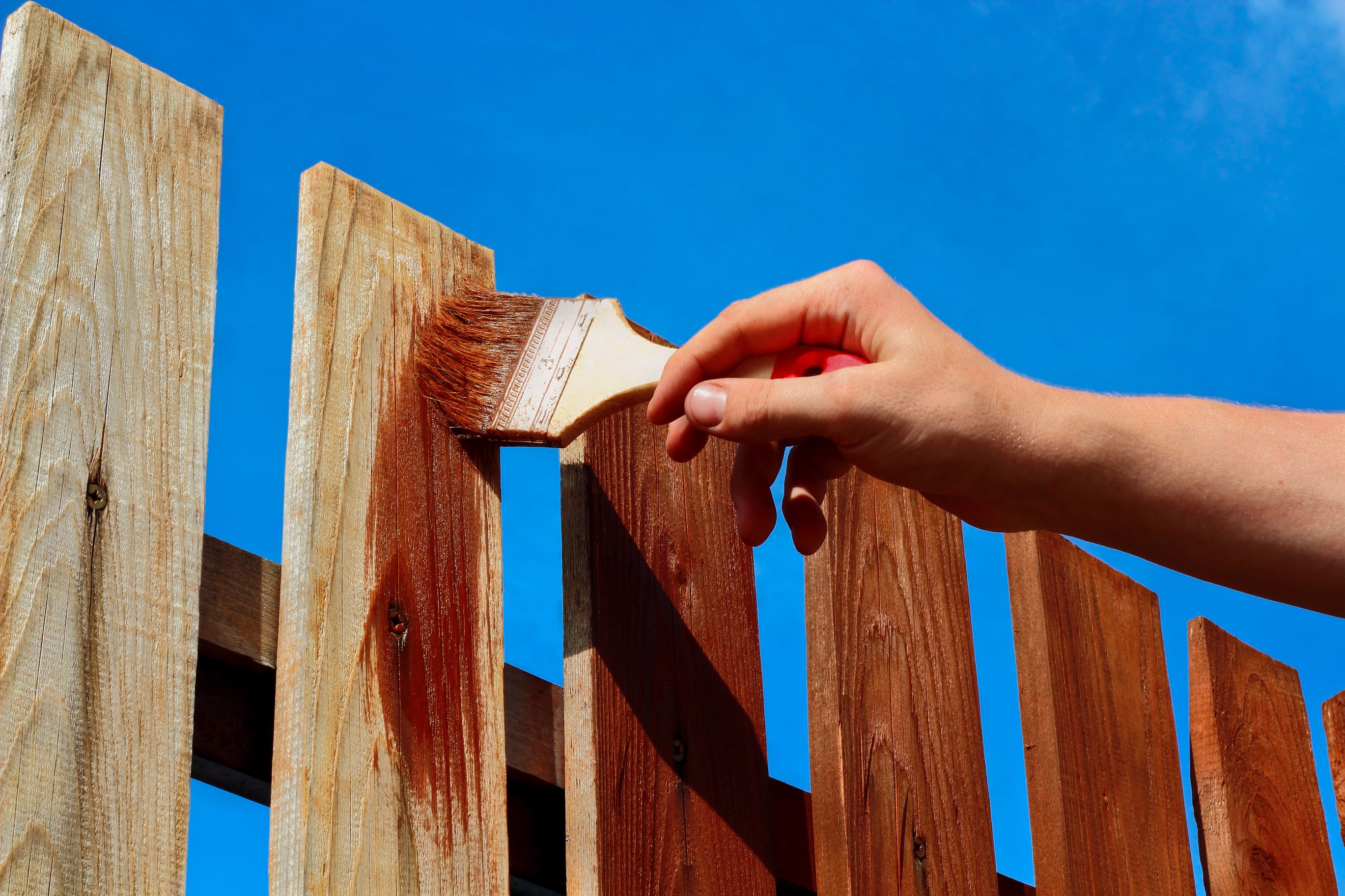 p painting fence with motor oil        
        <figure class=