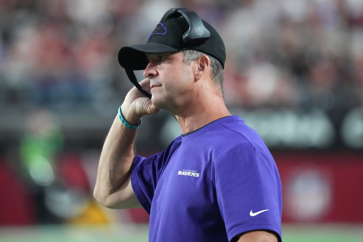 Ravens' John Harbaugh Surprises Brother Jim Harbaugh During CFP ...