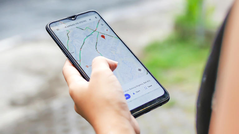 Traveler uses Google Maps in Bali