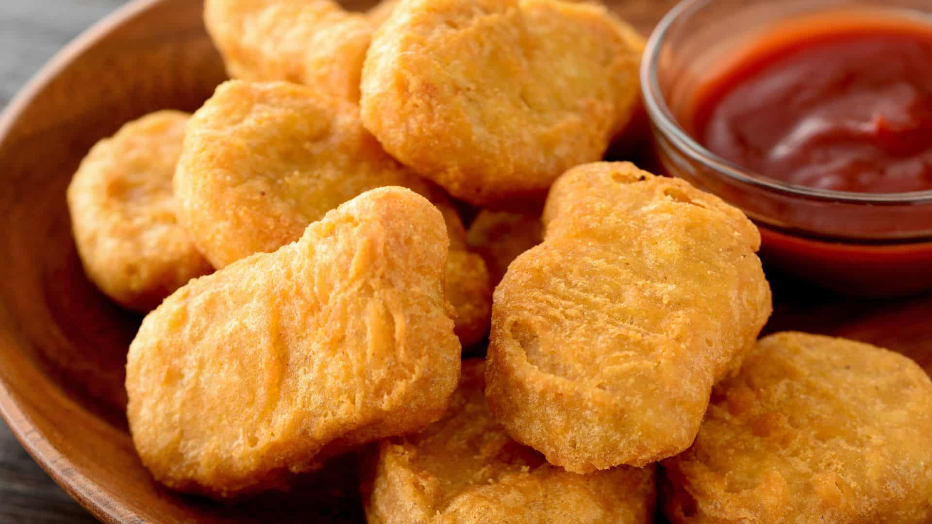 <p>You might think McDonald's nuggies are easy to make at home, but they’re actually quite complex to nail down.</p><p>This is because McD uses white meat chicken from the breast and wings. This part of the chicken is lean and has a light flavor. However, it also dries out quickly, so it’s incredibly hard to get right.</p><p>The chicken is ground, marinated with spices, shaped, and breaded before being popped into hot oil. Yum!</p>