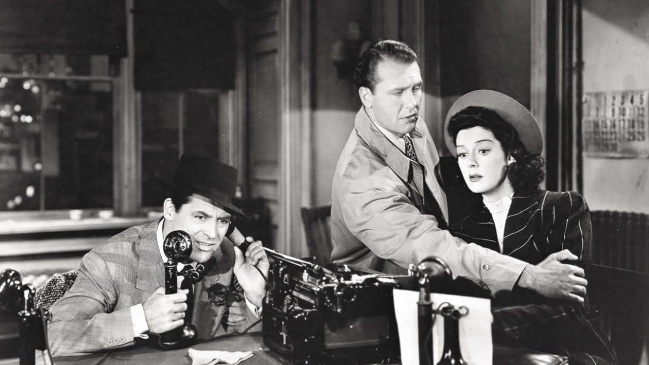 <p><span>Many moviegoers and critics consider </span><em><span>His Girl Friday </span></em><span>o</span>ne of <span>the finest screwball comedies ever. In truth, this intelligent comedy and drama also tackles serious issues in ways quintessential to this filmmaking era. </span></p><p><span>The story starts in a light and relatively innocuous way. A former reporter (Rosalind Russell) who plans to remarry visits her ex-husband and former boss, the head of one of the city’s best newspapers, to tell him the news. He still carries a torch for her and believes she has that fiery reporter spirit. So he partakes in somewhat harmless schemes to keep her from leaving town with her fiancé.</span></p><p><span>His feelings prove true when she becomes entangled with a story about a man who is due to be executed for killing a police officer but maintains his innocence.</span></p><p><a href="https://en.wikipedia.org/wiki/His_Girl_Friday" rel="nofollow noopener"><em><span>His Girl Friday</span></em></a><span> explores themes of corruption amongst those in authority as well as the media. Russell and Grant are chasing down a story, but more importantly, they are chasing the truth. The film promotes compassion for others and condemnation of those who sensationalize the news or lie entirely in the name of power or money.</span></p><p><span>Grant and Russell give incredible performances, individually and together. The script features some of the most fast-paced, intricate, and humorous dialogue in film history.</span></p>