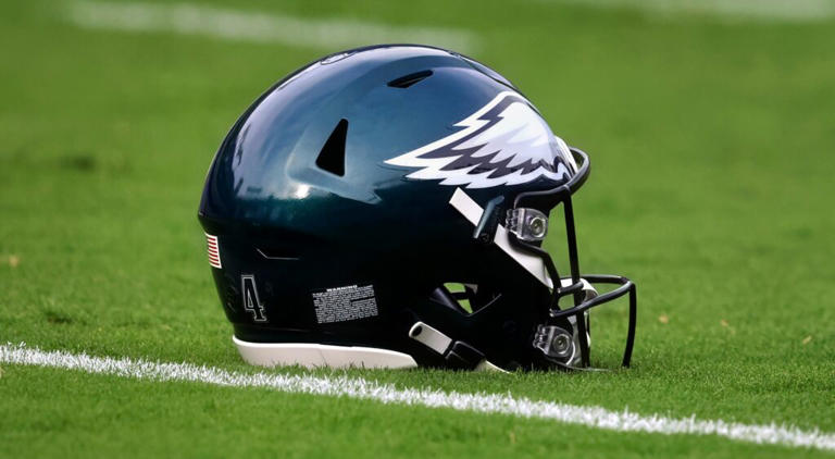 BALTIMORE, MARYLAND – AUGUST 12: A Philadelphia Eagles helmet sits on the grass before the start of a preseason game against the Baltimore Ravens at M&T Bank Stadium on August 12, 2023 in Baltimore, Maryland. (Photo by Rob Carr/Getty Images)