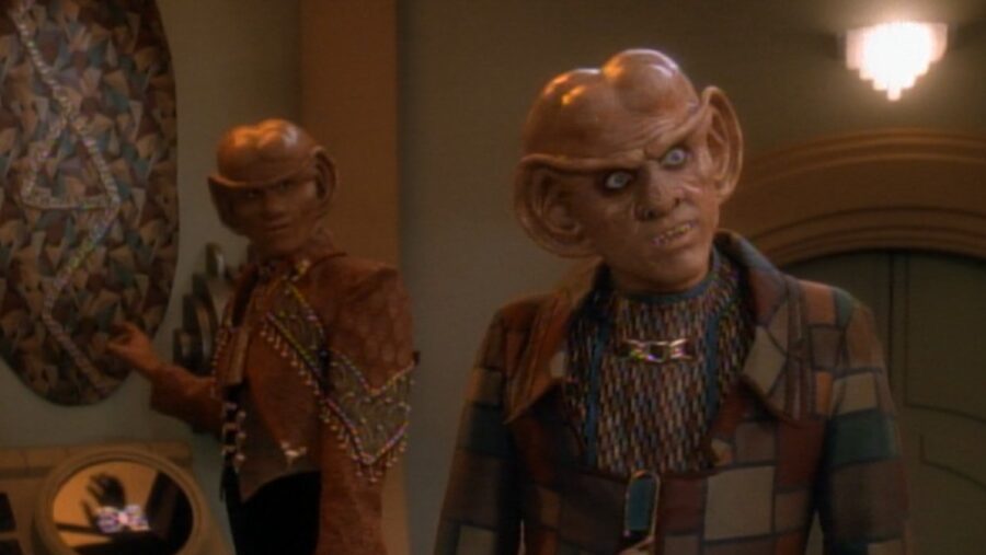 Liquidator Brunt (Jeffrey Combs) and Quark (Armin Shimerman) in the latter's Ferenginar home in Star Trek: Deep Space Nine