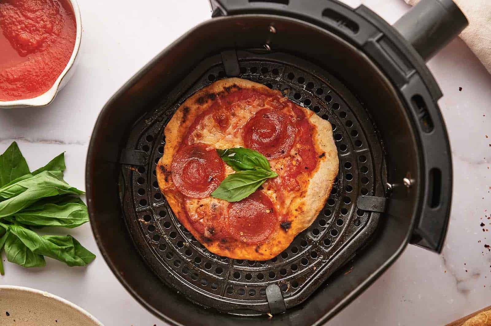 <p>Craving    pizza   for family feasts without the wait? Our Air Fryer Tortilla    Pizza   is the solution. Quick and crispy, it’s a delicious way to satisfy your    pizza   cravings without a long baking time.<br><strong>Get the Recipe: </strong><a href="https://www.splashoftaste.com/air-fryer-tortilla-pizza/?utm_source=msn&utm_medium=page&utm_campaign=msn">Air Fryer Tortilla Pizza</a></p>