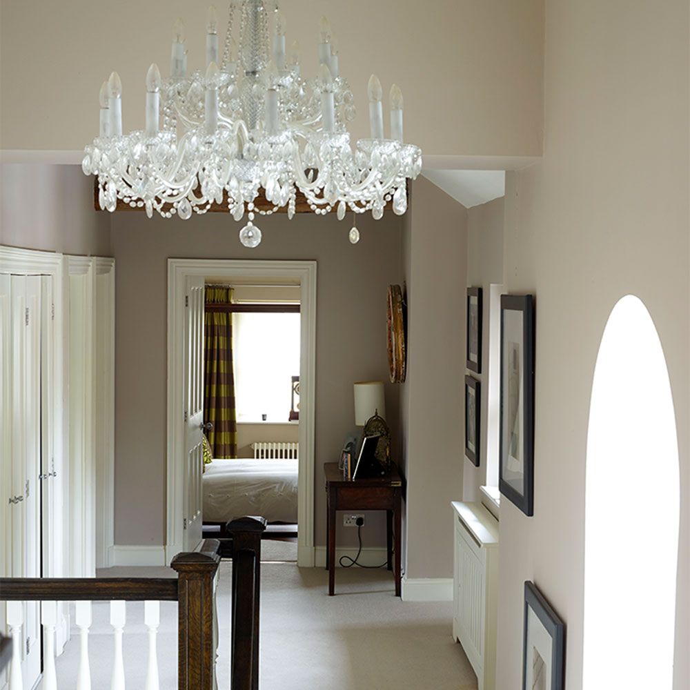 <p>                     Dress the landing and staircase with statement pieces to make it feel glam and not an afterthought. This grand glass chandelier exudes a glam vibe that is then echoed in the sophisticated grey colour palette, to ensure the landing feels well decorated to lead into the rooms beyond.                   </p>                                      <p>                     A smart radiator cover helps to enhance the look, ensuring the space feels well curated.                   </p>