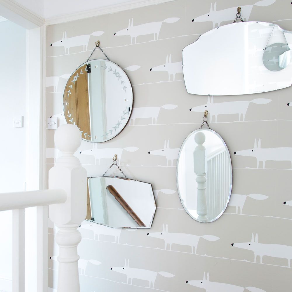 <p>                     When a landing is small and lacking natural light a mirror is the answer. Hanging a decorative mirror helps bounce light around the space to make it feel airy and more open.                   </p>                                      <p>                     Using multiple mirrors creates an alternative gallery wall, to add a stylish touch to the decor. Similarly a large mirror in the same place, on the wall at the top of the stairs, helps to fill the space with extra light and interest.                   </p>