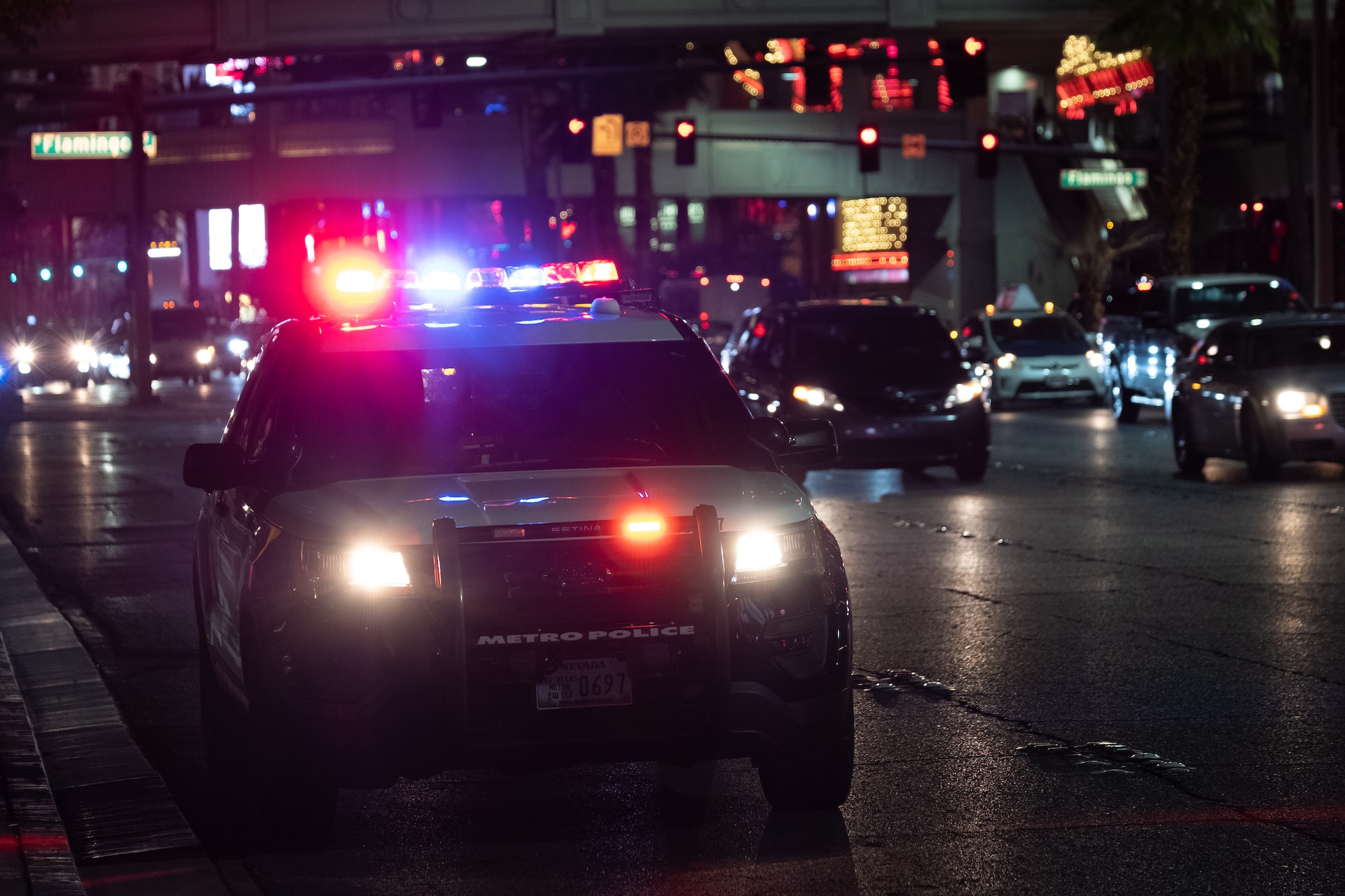 Why do cops always touch the back of the cars they pull over?