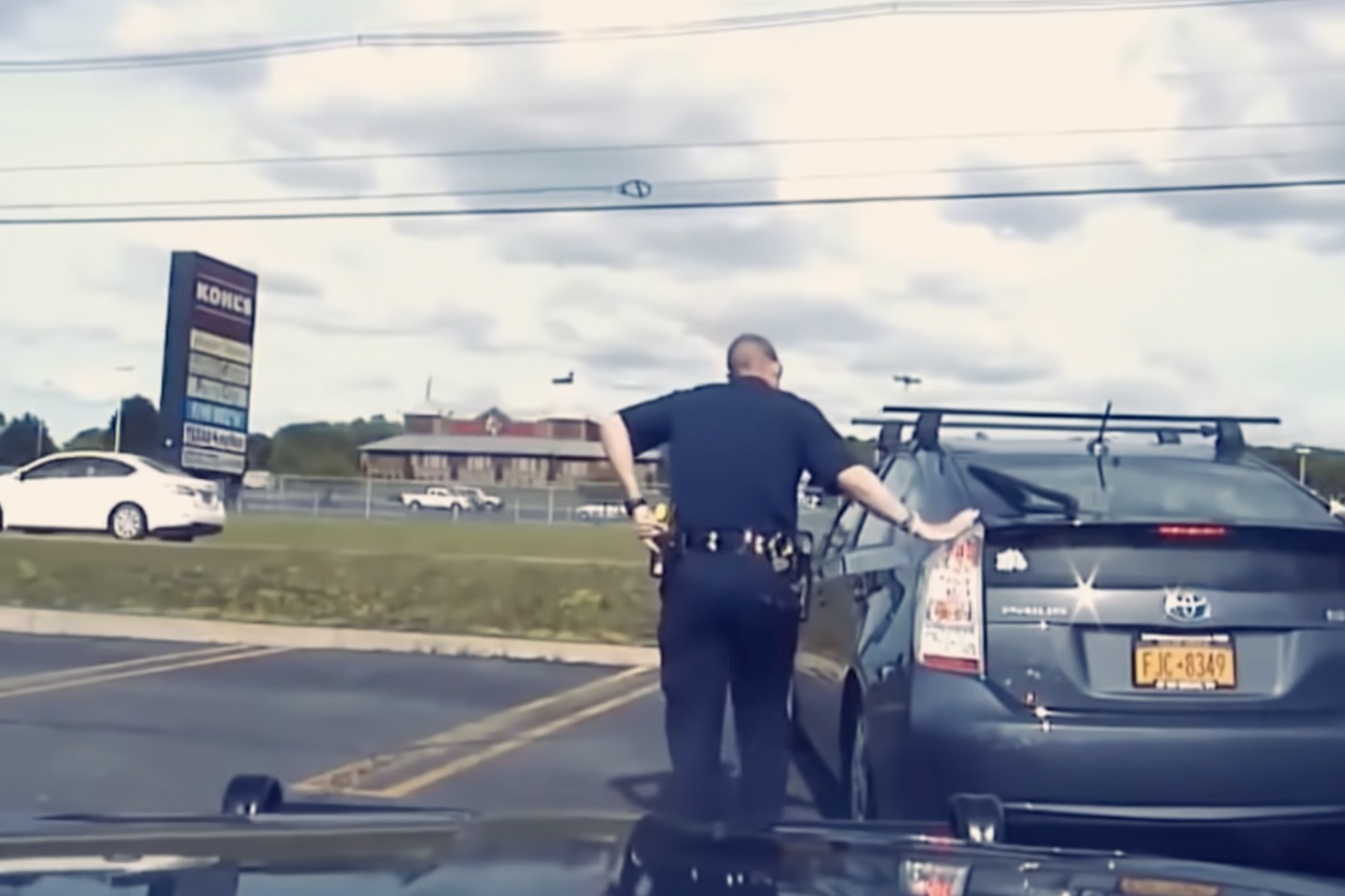 Why do cops always touch the back of the cars they pull over?