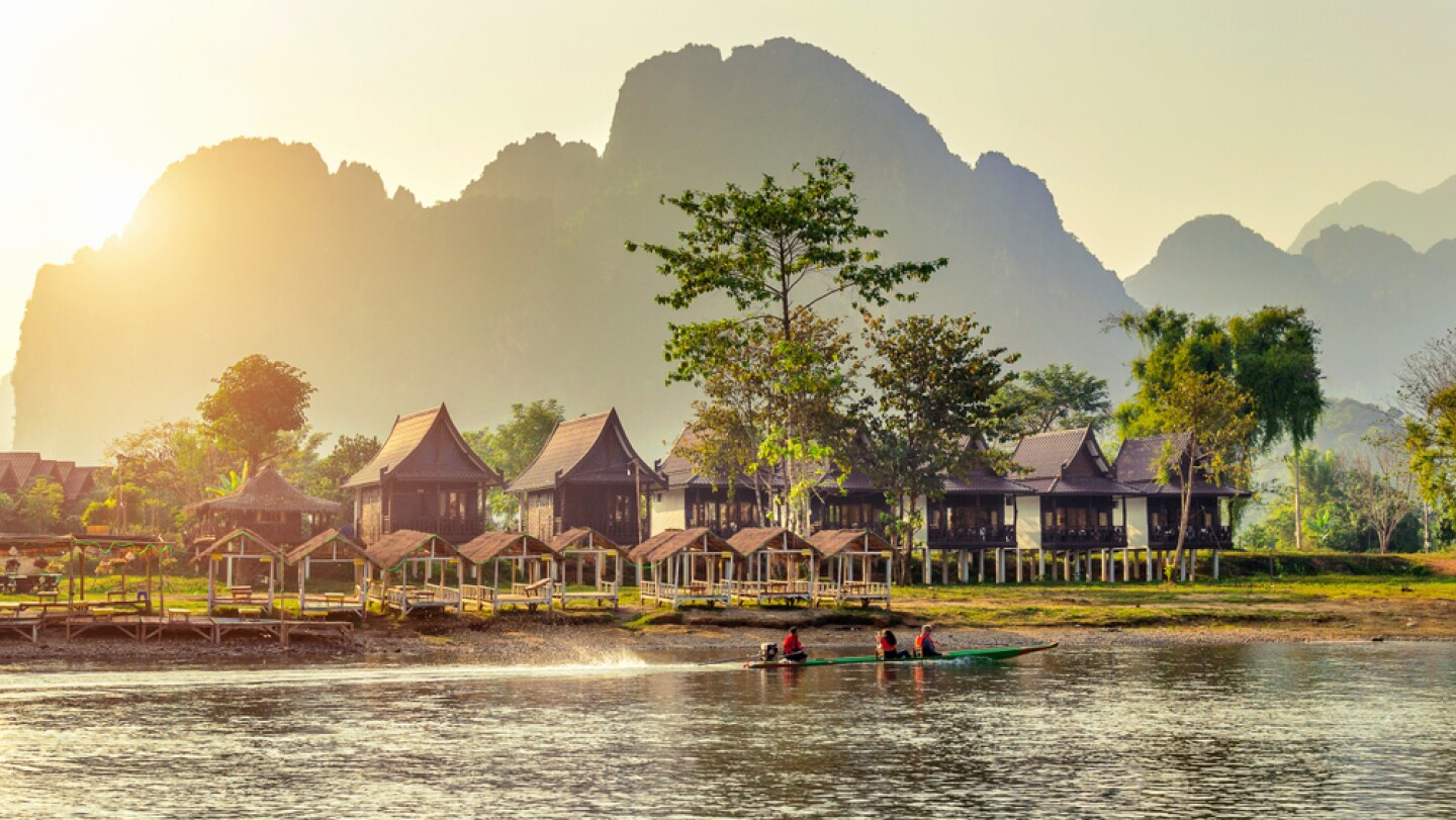 <h2>2. Laos</h2> <p>Laos feels like “Thailand 20 years ago”—that is to say, its landscapes are full of striking, mountainous jungles with every shade of green imaginable, minus the nearly <a class="Link" href="https://www.e-unwto.org/doi/epdf/10.18111/wtobarometereng.2020.18.1.7" rel="noopener">40 million tourists per year</a>. (In fact, Laos received only <a class="Link" href="https://wearelao.com/sites/default/files/Statistical-Report-on-Tourism-2019.pdf" rel="noopener">4 million tourists in 2019</a>, pre-COVID.)</p> <p>Landlocked Laos can be overlooked as tourists flock to the sugary shores of neighboring Thailand and Vietnam. But Laos is simply breathtaking, both in misty mountain scenery and its plentiful Buddhist temples and French architecture. Hit the streets of UNESCO-recognized Luang Prabang before ascending into the mountains to discover mountain resorts with views of jade-colored peaks and the flow of the mighty Mekong River. Hop the high-speed Lao-China Railway to continue to Vientiane for more architecture, restaurants, galleries, and temples.</p> <h3>Where to stay</h3> <ul>   <li>Book now: <a class="Link" href="https://www.riversidevangvieng.com/" rel="noopener">Riverside Boutique Resort</a></li>  </ul> <p>Travelers to Laos should make a point to stay at <a class="Link" href="https://www.riversidevangvieng.com/" rel="noopener">Riverside Boutique Resort </a>located in Vang Vieng. Overlooking the Song River, this boutique resort has spectacular views of the jungle-covered mountains alongside amenities like a gorgeous swimming pool and an on-site restaurant.</p>