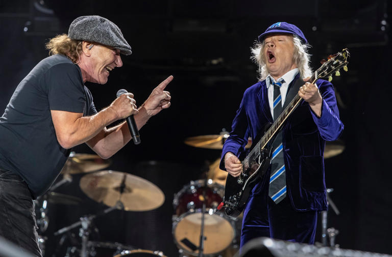 AC/DC lead vocalist Brian Johnson and lead guitarist Angus Young perform "If You Want Blood (You've Got It)" together during the Power Trip Music Festival at the Empire Polo Club in Indio, Calif., Saturday, Oct. 7, 2023.