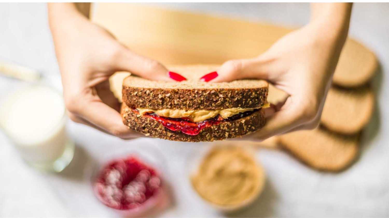 <p>Carrying a jar of peanut butter can get you in trouble, so make a sandwich instead. Grab a squeezy pack if you fear smushing it in your bag. It's an excellent solution for single-time uses. However, have a backup meal ready if someone on the flight has a severe peanut allergy.</p>