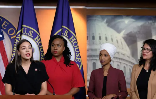 U.S. Rep. Alexandria Ocasio-Cortez (D-NY) speaks as Reps. Ayanna Pressley (D-MA), Ilhan Omar (D-MN), and Rashida Tlaib (D-MI) listen during a press conference at the U.S. Capitol on July 15, 2019 in Washington, DC. (Photo by Alex Wroblewski/Getty Images)