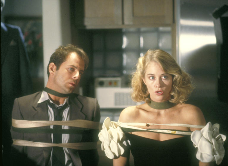 UNITED STATES - MARCH 03: MOONLIGHTING - Pilot - Season One - 3/3/1985, Cybill Shepherd stars as former fashion model Maddie Hayes, who has a reversal of fortune leaving her with few assets... one of which is the quirky "Blue Moon Detective Agency" and employee Bruce Willis as detective David Addison., (Photo by ABC Photo Archives/ABC via Getty Images)