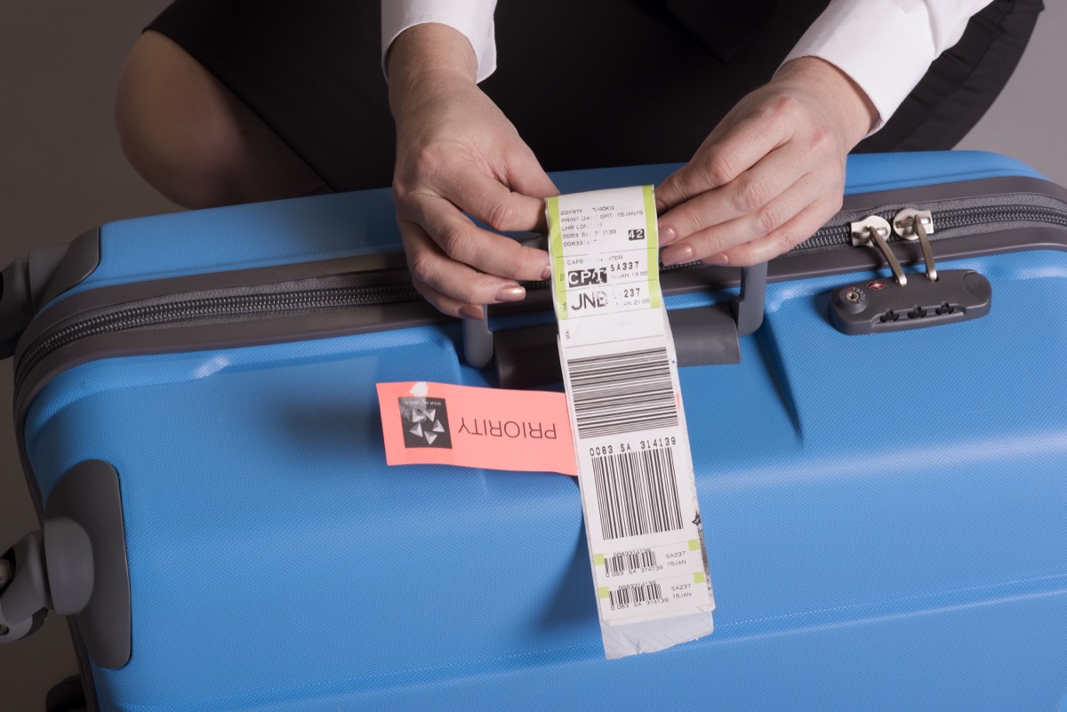<p>Your checked luggage gets adorned with a new sticker on every trip you take. But if you're not careful, this could wind up creating a confusing mess for handlers.</p><p>"Flight crews depend on current bag tags and stickers to ensure each item is getting on the right flight," <strong>Audrey Kohout</strong>, CEO of <a rel="noopener noreferrer external nofollow" href="https://www.luggageforward.com/">Luggage Forward</a>, tells <em>Best Life</em>. "If there are multiple old stickers and tags on your bag, the chances of the cargo crew scanning the wrong barcode increases."</p><p>"It's always best to remove all old stickers to prevent this from happening in the first place," she says, clarifying that the smaller stickers could be on a surface of your bag you don't expect, such as the side or bottom.<p><strong>RELATED: <a rel="noopener noreferrer external nofollow" href="https://bestlifeonline.com/trip-planning-tips-from-travel-agents/">26 Best Trip-Planning Hacks Straight From Travel Agents</a>.</strong></p></p>