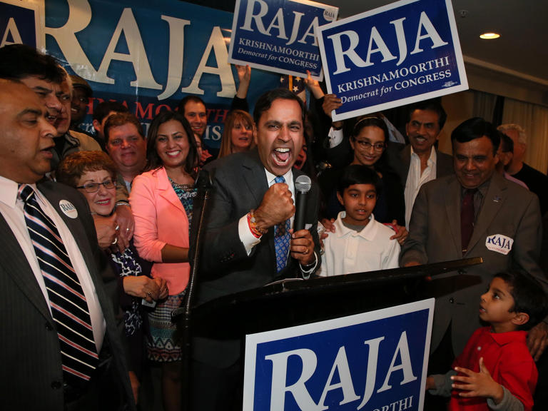 Surrounded by family and supporters, Raja Krishnamoorthi gives a passionate victory speech at the Wyndham Garden Hotel in Schaumburg on March 15, 2016. Krishnamoorthi won the democratic party nomination for the 8th U.S. Congressional District.