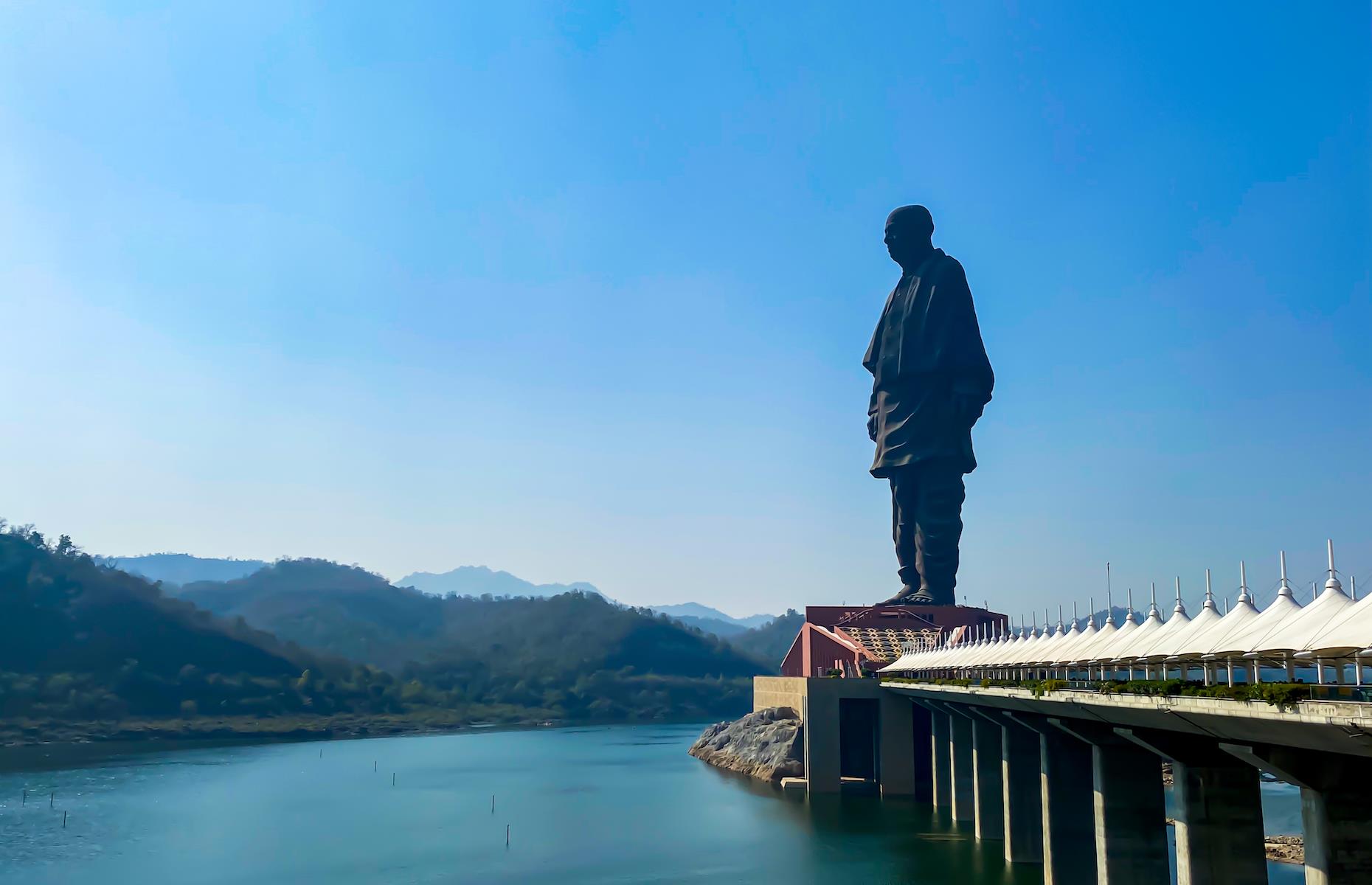 <p>Towering above the basin of the Narmada River and the Sardar Sarovar dam in Gujarat state, surrounded by the Satpura and Vindhyachal hills, the Statue of Unity depicts independence leader Sardar Vallabhai Patel. It was unveiled in 2018 and cost around $389 million. At 597 feet (182m) it is twice the size of the Statue of Liberty and claimed the record for being the world’s tallest statue from China’s Spring Temple Buddha, which sits at a comparatively piddling 420 feet (128m) high. </p>