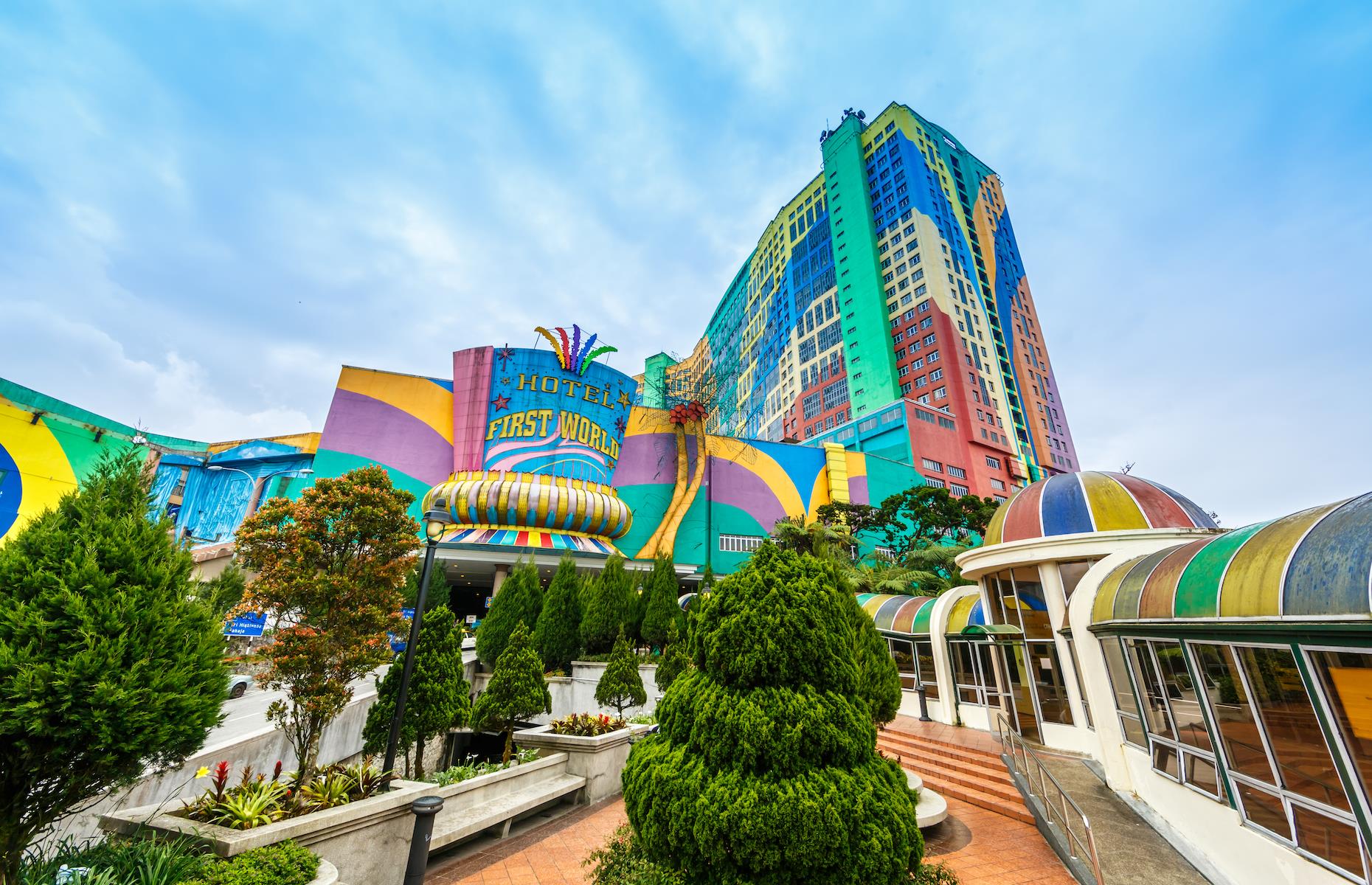 <p>Bright and brash, this behemoth in the Genting Highlands, just north of Kuala Lumpur, is the largest hotel in the world and proud of it. The First World Hotel is part of Resorts World Genting and has 7,351 guest rooms set across its two main rainbow-colored towers. As you’d expect, there’s a wide choice of rooms, from the bijou standard room to the world club rooms featuring 420 square feet (39sqm) of living space. The three-star hotel leads into the wider resort which has a shopping mall, casino, indoor theme park and golf course.</p>  <p><strong><a href="https://www.loveexploring.com/galleries/72892/the-worlds-tallest-hotels-with-breathtaking-views?page=1">These are the highest hotel rooms in the world</a></strong></p>