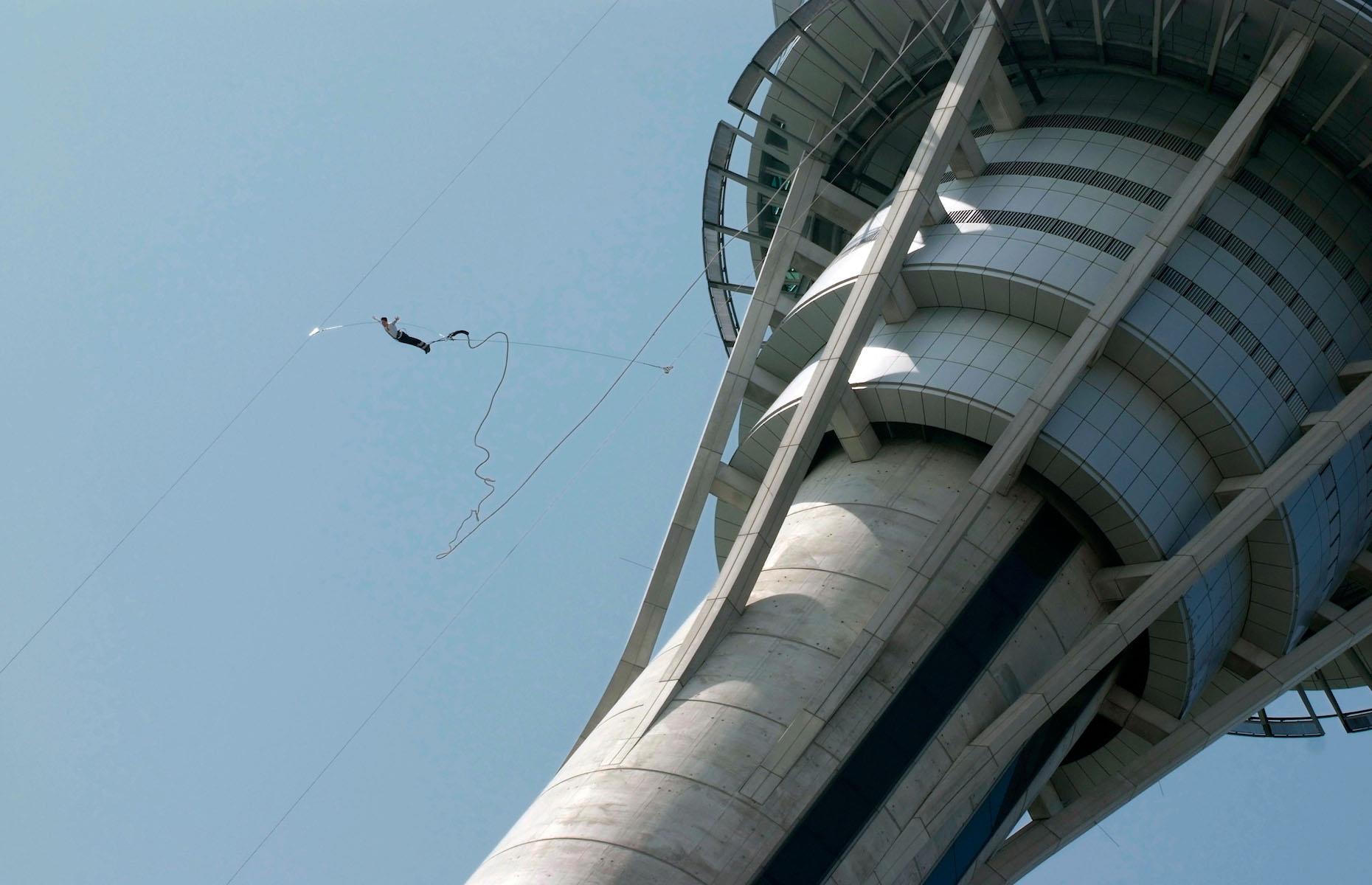 <p>Got a serious head for heights and an adrenalin craving? Make for the Macau Tower and push yourself to the limit on its record-making bungee jump – it's the world's highest from a commercial building, according to the<em> Guinness Book of Records</em>. The brainchild of New Zealand extreme sport pioneer AJ Hackett, Skypark Macau Tower’s bungee jump sees those who are game leap off a platform at a height of 764 feet (233m) from Macau's lofty tower. In winter you can even make the jump at night. After that, the landmark's other thrilling attractions – the skyjump, skywalk and tower climb – will barely get your heart racing. </p>