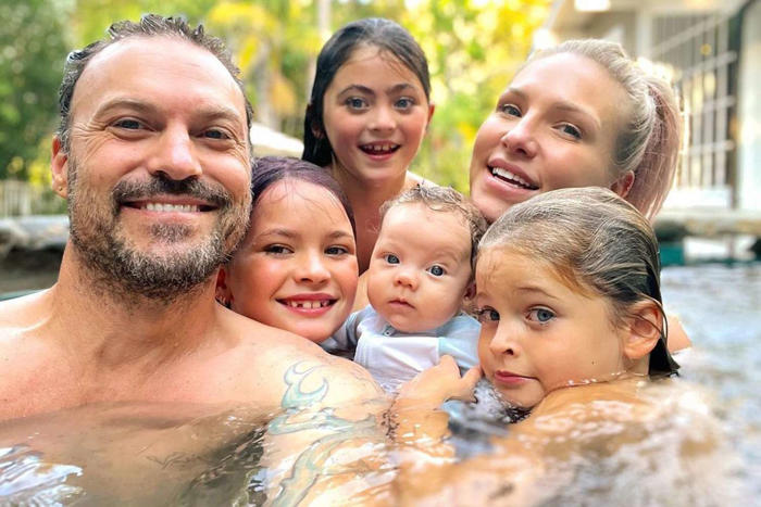 sharna burgess celebrates brian austin green on father's day as she shares rare photo with all 5 of his kids