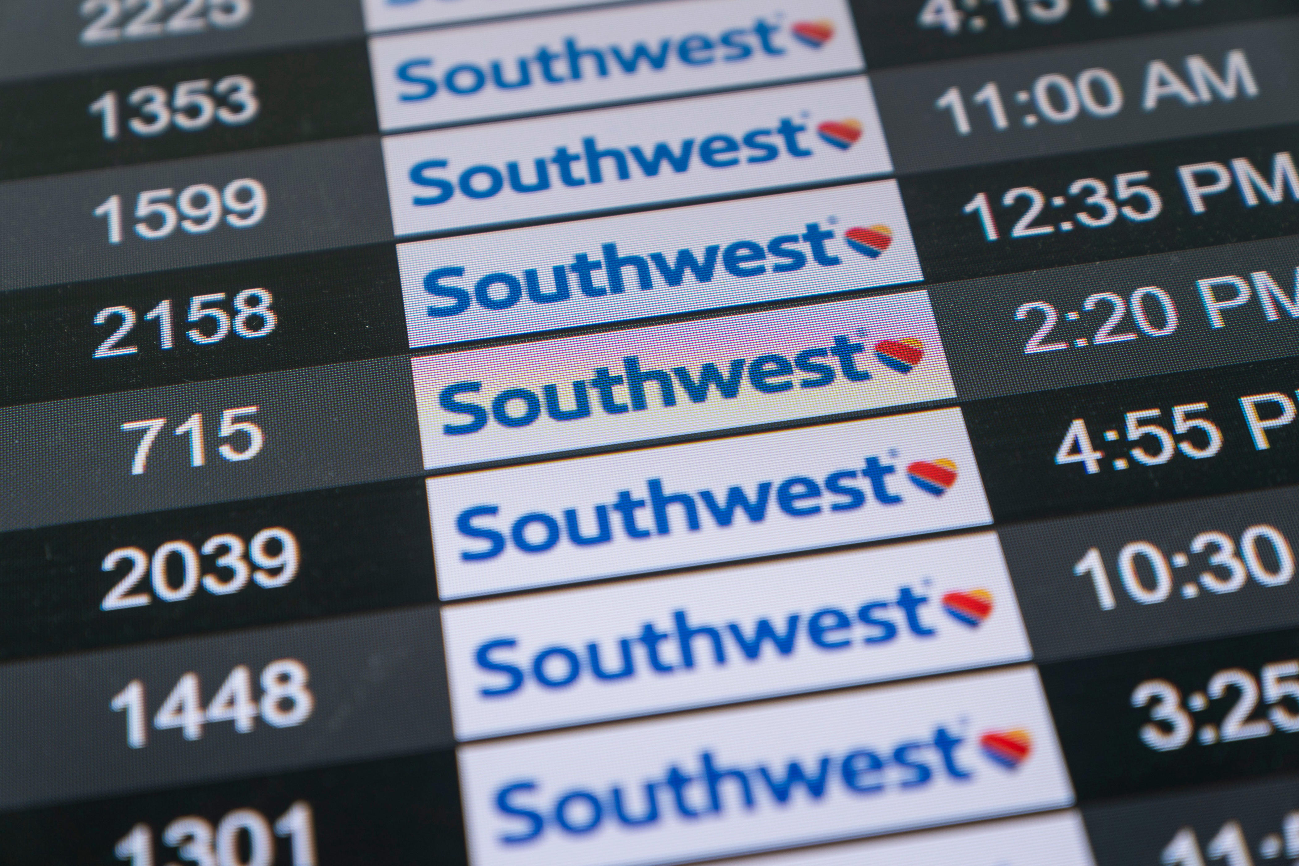 A screen shows arrival times for Southwest Airlines flights at the Los Angeles International Airport in Los Angeles, Tuesday, April 18, 2023.