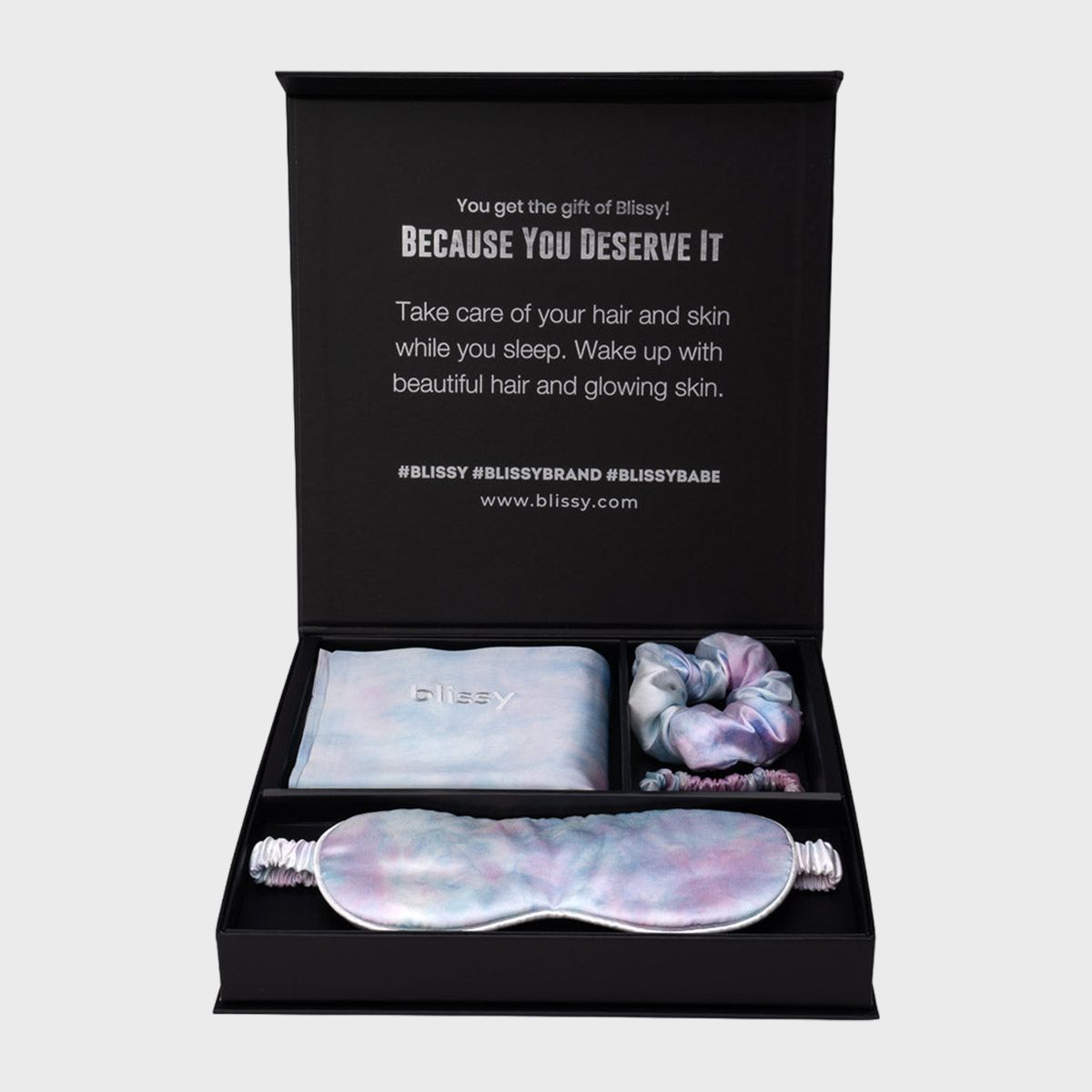 <p>Give the gift of elevated sleep with <a href="https://blissy.com/products/blissy-dream-set-tie-dye-standard" rel="noopener noreferrer">Blissy's dream set</a>. She'll receive a luxurious silk pillowcase, eye mask and two hair scrunchies packed in a giftable box. It's all machine washable, but that's not even the best part. In addition to feeling like a queen, using a <a href="https://www.rd.com/list/best-silk-pillowcase/" rel="noopener noreferrer">silk pillowcase</a> is actually better for her skin and hair.</p> <p class="listicle-page__cta-button-shop"><a class="shop-btn" href="https://blissy.com/products/blissy-dream-set-tie-dye-standard">Shop Now</a></p>