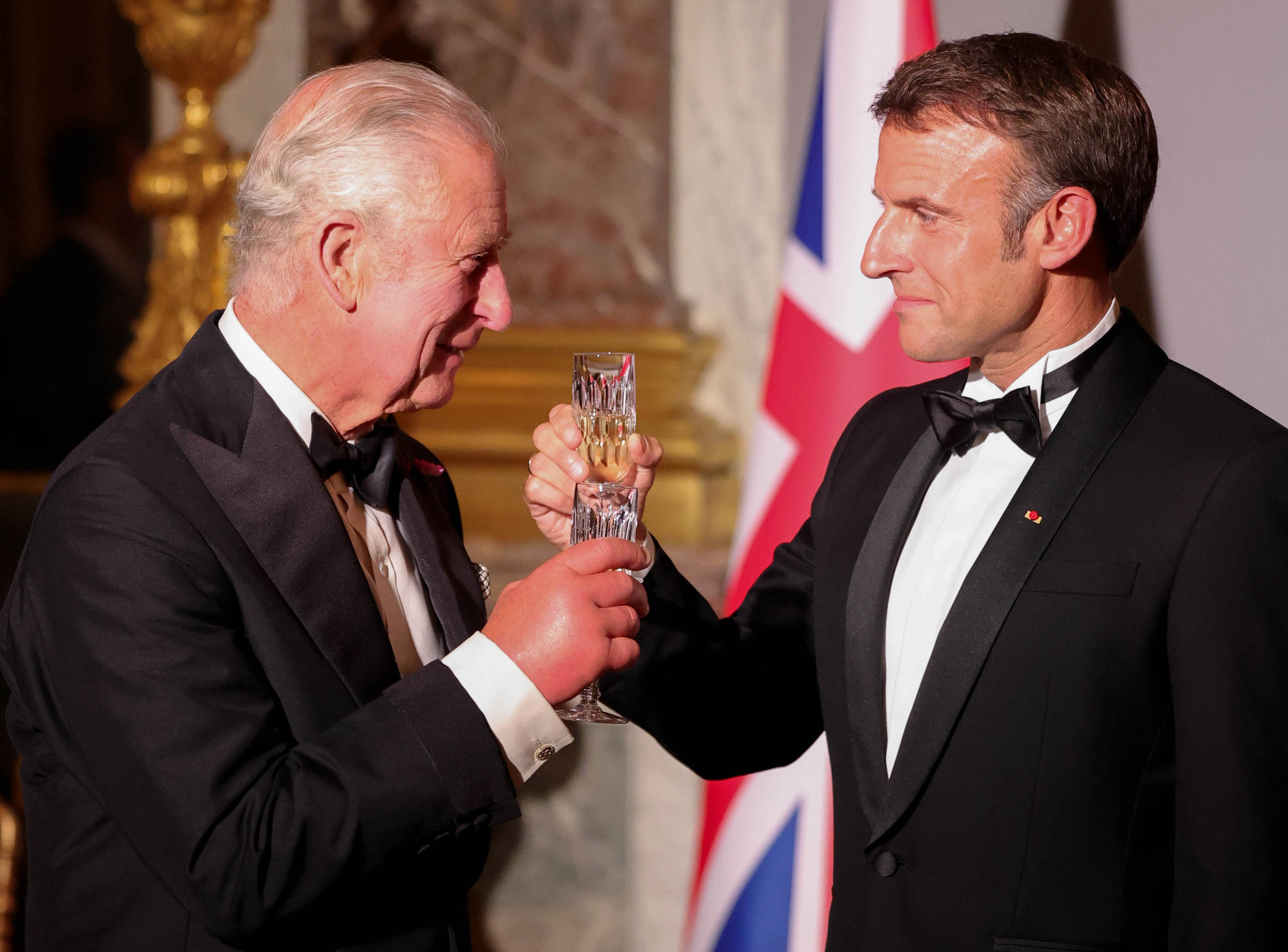 <p>King Charles III and France's President Emmanuel Macron shared a toast celebrating the U.K.-France relationship during a state banquet inside the Hall of Mirrors at the Palace of Versailles outside Paris on Sept. 20, 2023, the first night of <a href="https://www.wonderwall.com/entertainment/king-charles-iii-and-queen-camilla-in-france-see-the-best-photos-from-the-royals-official-state-visit-791038.gallery">the monarch's three-day visit to France.</a></p>