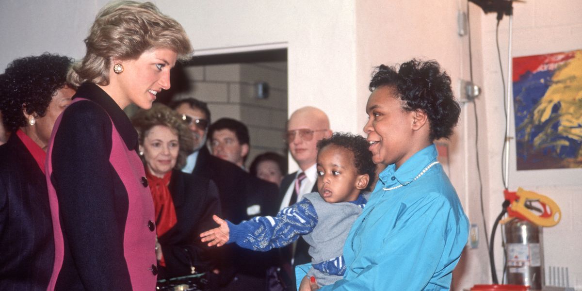 <p>Diana speaks to a woman and child while visiting a day care center in the Lower East Side. </p>