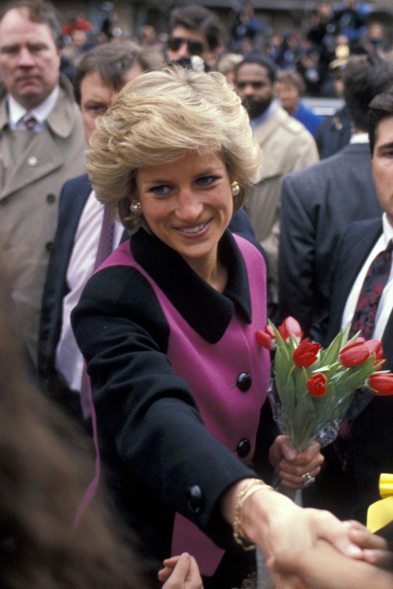 <p>Princess Di greets well-wishers on her way to the Henry Street Settlement, a nonprofit social services agency, in New York's Lower East Side. </p>