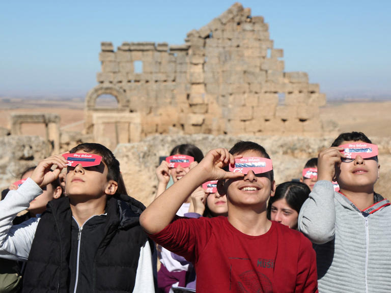 People watch a partial solar eclipse in Diyarbakir, Turkey. Sertac Kayar/Reuters