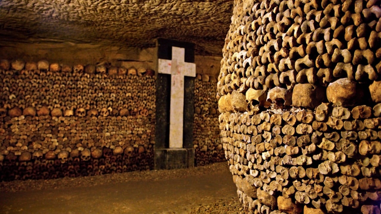 <p><span>The Catacombs are scary because they contain the remains of around six million people. Visitors navigate through dimly lit tunnels lined with neatly arranged skulls and bones, creating an unsettling experience beneath the streets of Paris. The Catacombs are popular year-round, with slightly fewer visitors during the shoulder seasons of spring and autumn, when weather isn’t as pleasant.</span></p>