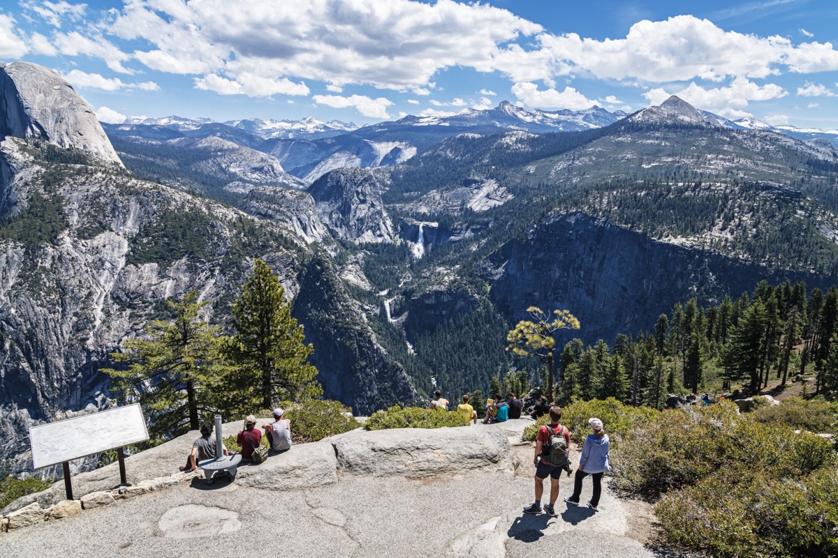<p>Rounding out this list is another popular, well-known spot: Yosemite. Not only is it great for walking, but this park may have even more breathtaking views in 2023.</p><p>"This year would be a prime time to see Yosemite National Park due to the <a rel="noopener noreferrer external nofollow" href="https://bestlifeonline.com/yosemite-access-rockslide-news/">record amount</a> of precipitation they received. This means that waterfalls and rivers are flowing at full force!" Todd says. "Other reasons to check out Yosemite are to see iconic granite cliffs, beautiful meadows, and giant Sequoia trees. Yosemite is known for the challenging Half Dome hike and the 211-mile John Muir Trail, a popular thru-hiking trail."</p><p>If you do end up challenging yourself with Half Dome, however, Todd says you'll want to plan to backpack and camp overnight in Little Yosemite Valley.</p><p>"This helps to break up the length and difficulty of the trail instead of trying to tackle the whole 15-mile trail all at once," he explains. "Other beautiful trails I highly recommend doing are Bridalveil Fall, Mirror Lake, and the Mist Trail, which takes you by Vernal and Nevada Falls."<p><strong>For more travel advice delivered straight to your inbox, <a rel="noopener noreferrer external nofollow" href="http://bestlifeonline.com/newsletters">sign up for our daily newsletter</a>.</strong></p></p><p>Read the original article on <em><a rel="noopener noreferrer external nofollow" href="https://bestlifeonline.com/best-national-parks-to-walk-through">Best Life</a></em>.</p>