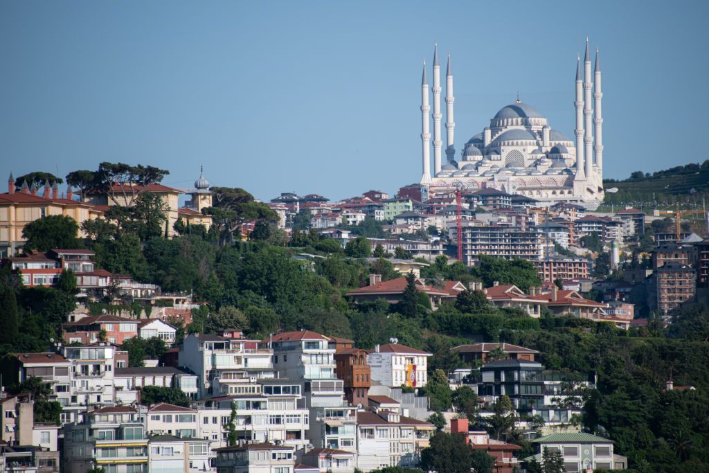 <p>Traditional and modern architectural styles exist side by side along the Istanbul skyline. For instance, this shot shows the recently built Camlica mosque towering over the city’s residential buildings.</p>
