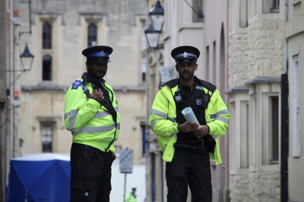Man named and charged after police officer 'knocked unconscious' during ...