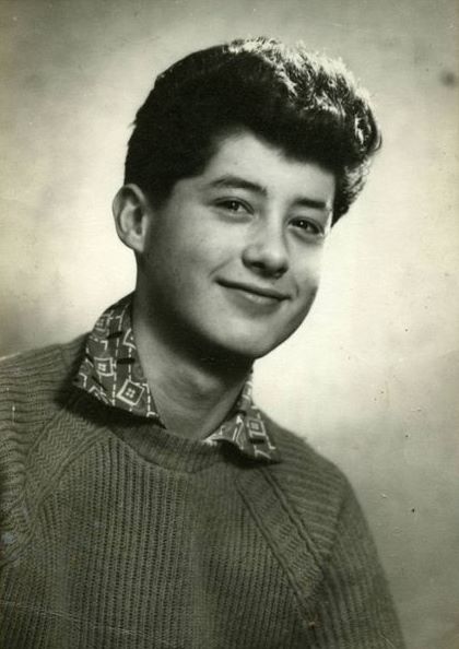 <p><span>In 1957, a young Jimmy Page posed for his school photo wearing the traditional uniform of St. Anne's Catholic School in Heston, England. Even at this early age, it was clear that he had an eye for fashion and style, with his hair perfectly coiffed into a classic 1950s quiff. His bright eyes sparkled with the promise of future greatness as if even then he knew that one day he would become one of the most influential guitarists in rock history. At just 12 years old, Jimmy Page already had the charisma and talent to make him stand out from the crowd - no wonder he went on to be part of Led Zeppelin!</span></p>
