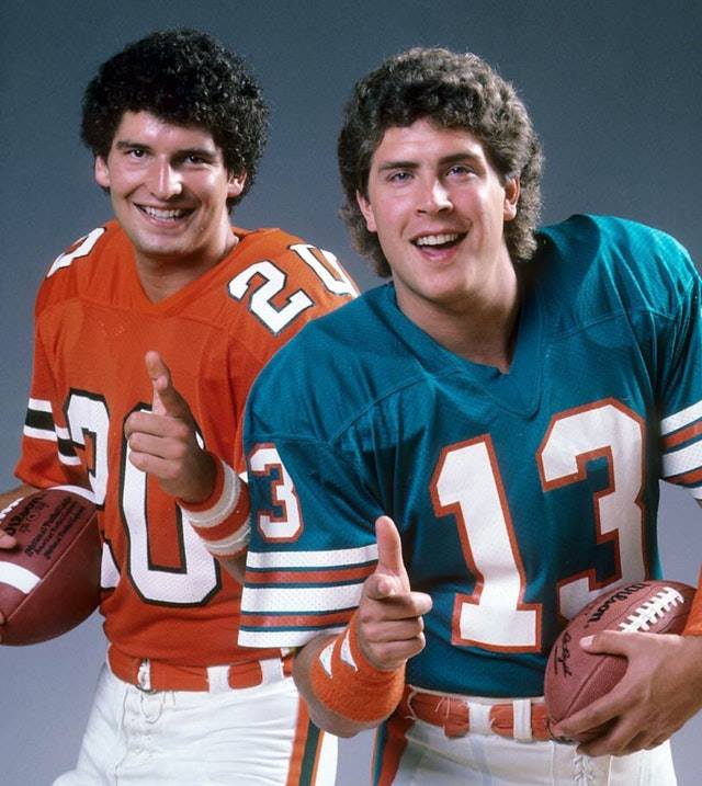 <p><span>It was 1984, and the NFL was buzzing with excitement. Two of the most iconic quarterbacks in history were on display - Bernie Kosar and Dan Marino. With their big personalities and even bigger arms, they electrified stadiums around the country. Fans would flock to see them battle it out each Sunday, knowing that no matter who won or lost, they'd be treated to a show full of thrilling passes, daring runs, and epic comebacks. It was an unforgettable era for football fans everywhere, one that will never be forgotten!</span></p>