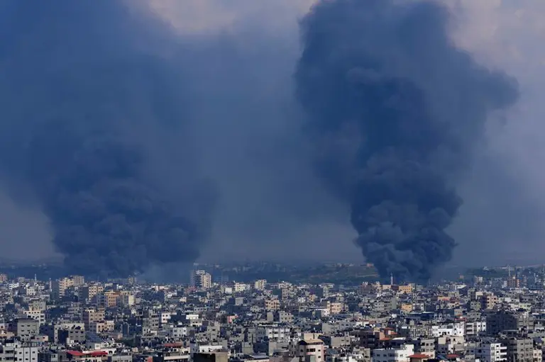 Smoke rises following Israeli airstrikes in Gaza City