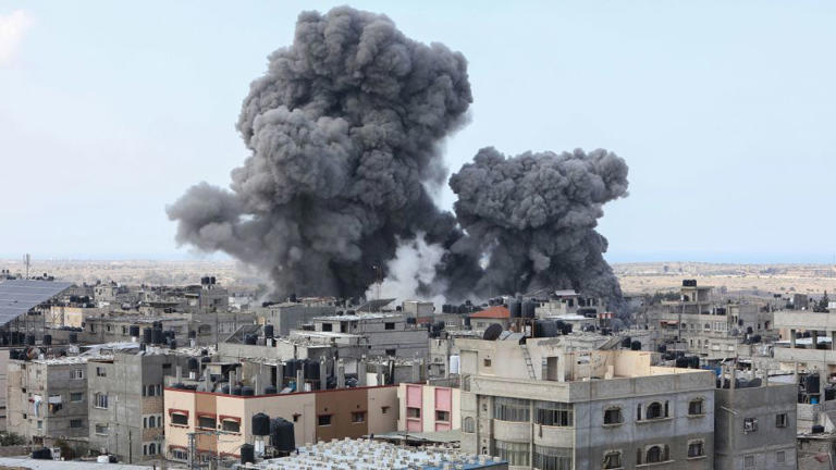 Smoke billows during an Israeli air strike in Rafah in southern Gaza on October 12. - Said Khatib/AFP/Getty Images