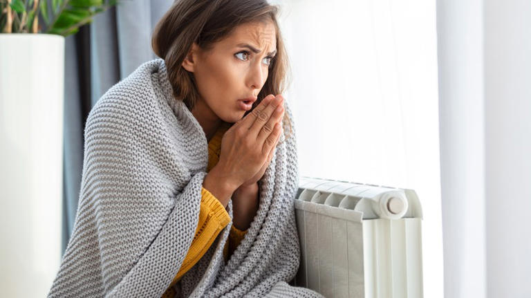 woman wrapped up in blankets