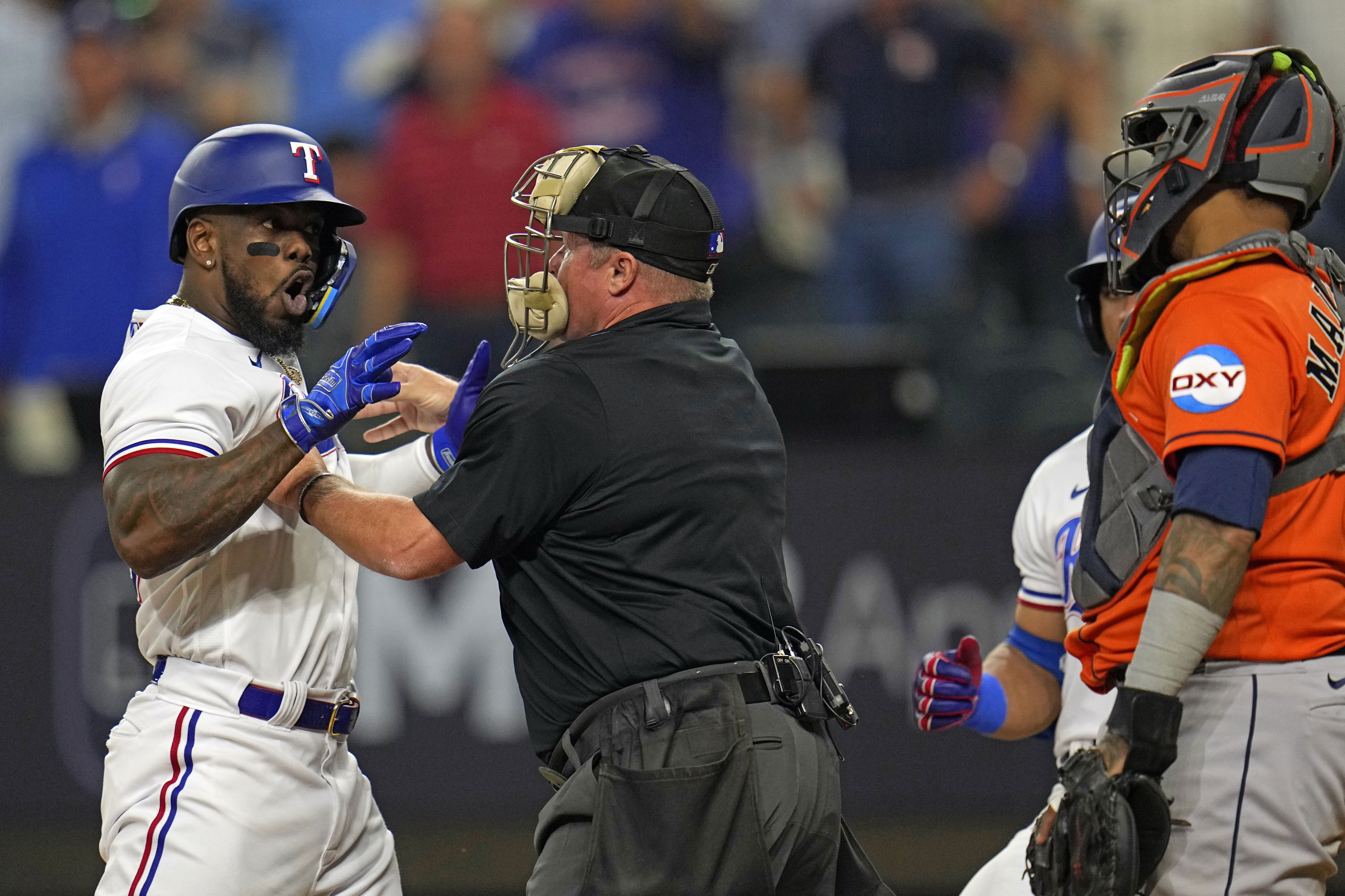 The Rangers Astros brawl after Adolis Garcia was hit by pitch in 6 photos